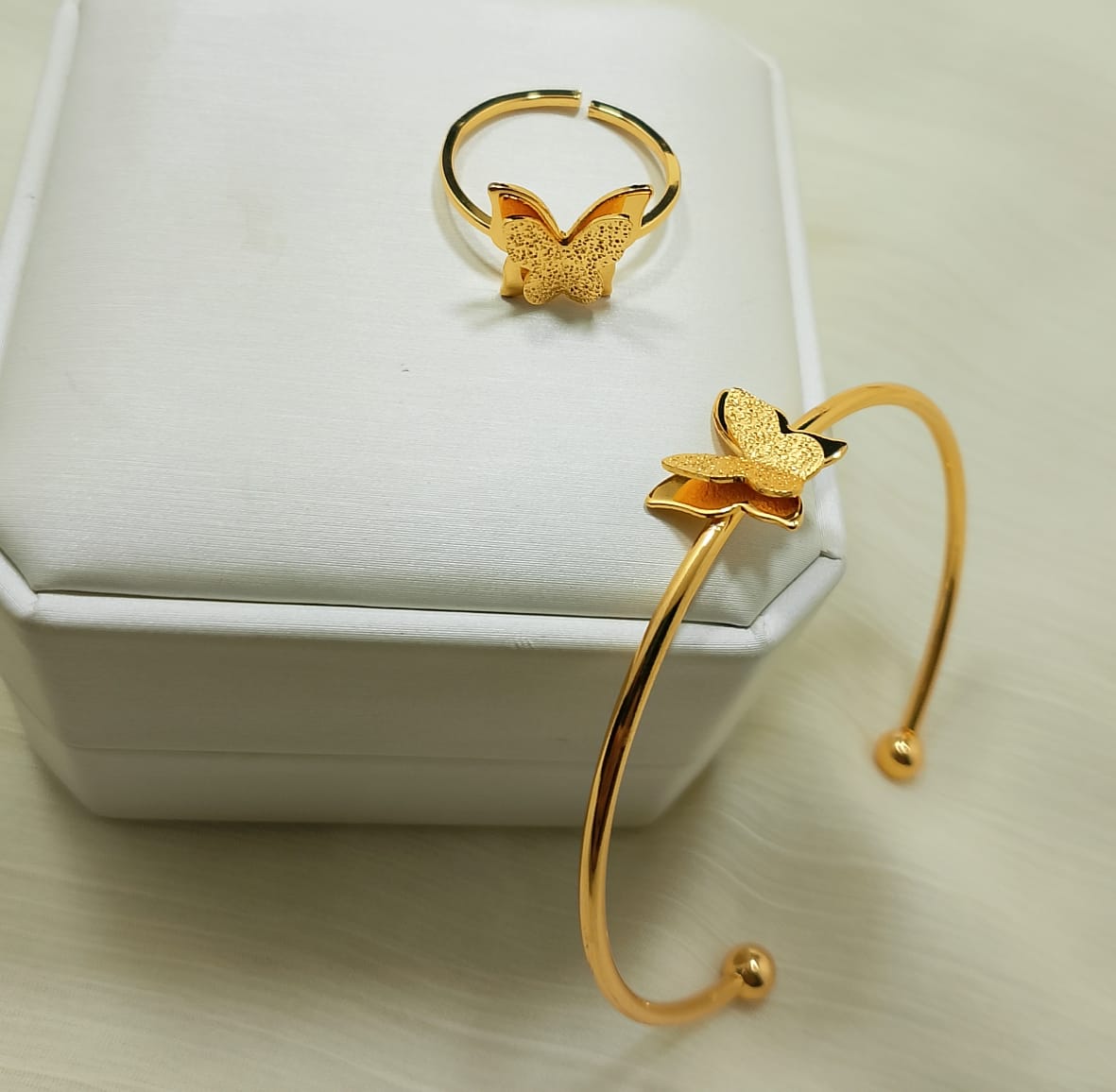 Butterfly 2 piece adjustable Kara and Ring best quality.